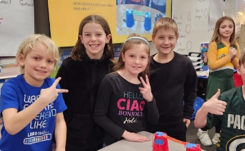 Group giving peace sign