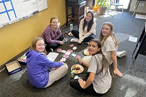 Girls playing cards