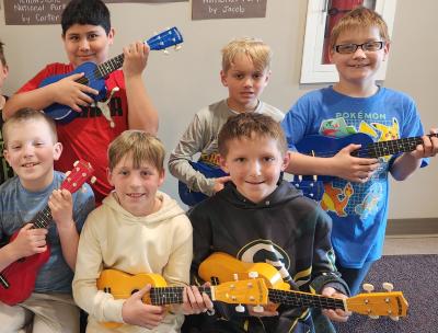 Students holding instraments