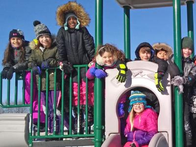 Kids pose on playground