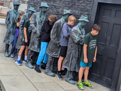kids and statues